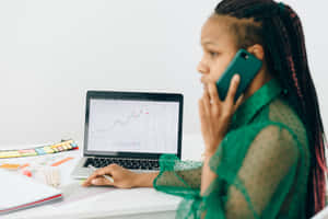 Businesswoman Analyzing Stock Market Wallpaper