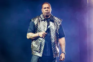 Busta Rhymes Performingon Stage Wallpaper