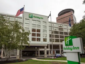 Bustling Downtown Rochester At Dusk Wallpaper