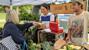 Bustling Farmers Market With Fresh Produce Wallpaper