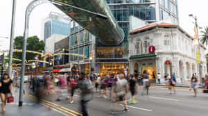 Bustling_ Orchard_ Road_ Singapore Wallpaper