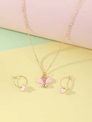 Butterfly Jewelry Set Pastel Backdrop Wallpaper