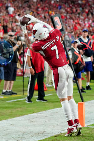 Byron Murphy Dominating The Field In Action Wallpaper