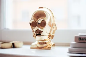 C-3po, The Golden Humanoid Droid In A Dynamic Pose Wallpaper