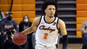 Cade Cunningham Cowboys Basketball Action Wallpaper