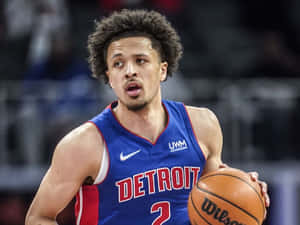 Cade Cunningham Detroit Pistons Game Action Wallpaper