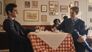 Cafe Conversation Two Men Suits Wallpaper