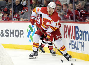 Calgary Flames Matthew Tkachuk Hockey Puck Wallpaper