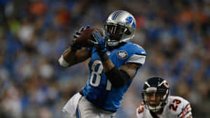 Calvin Johnson Catching Football Wallpaper