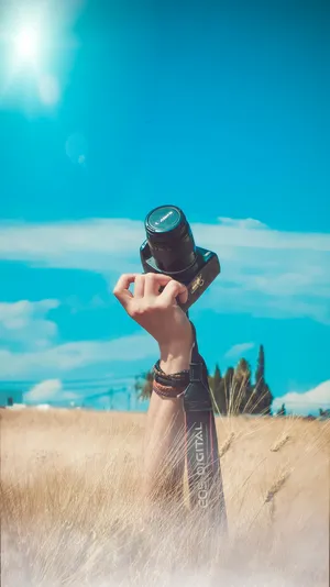 Cameraman's Creative Perspective Wallpaper