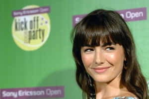Camilla Belle Exudes Charm During A Photoshoot Wallpaper
