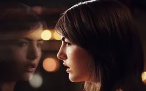 Camilla Belle Radiant In A Red Dress Wallpaper