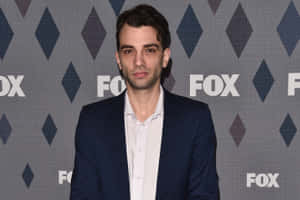 Canadian Actor Jay Baruchel In A Contemplative Pose Wallpaper