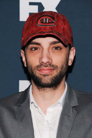 Canadian Actor Jay Baruchel Posing For A Photoshoot Wallpaper