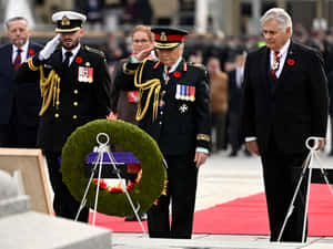 Canadian Soldiers Paying Tribute On Remembrance Day Wallpaper