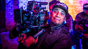 Canal Kondzilla Holding A Camera Wallpaper