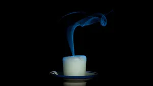 Candle With Blue Smoke Wallpaper