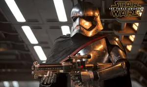 Captain Phasma In Full Armor With Her Blaster Rifle Wallpaper