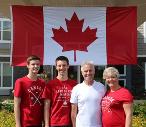 Caption: A Family's Loving Bond Celebrated On Family Day Wallpaper