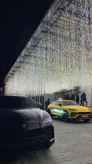 Caption: A Happy Family Driving In Their Comfortable Car Wallpaper