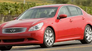 Caption: A Majestic Infiniti G37 At Twilight Wallpaper