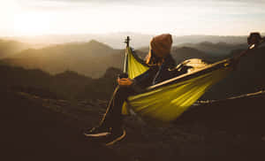 Caption: A Peaceful Evening At A Minimalist Campsite Wallpaper