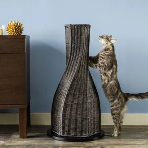 Caption: A Playful Cat Enjoying Scratching Post Wallpaper