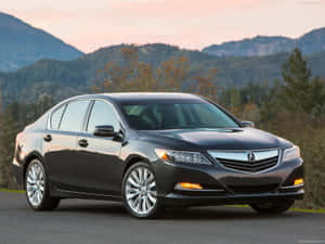 Caption: A Sleek Acura Rlx On The Open Road Wallpaper