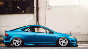 Caption: A Sleek Acura Rsx Type-s In Its Full Glory Wallpaper