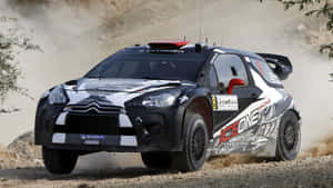 Caption: A Sleek Citroen Ds3 In Motion Wallpaper