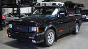 Caption: A Striking View Of A Gmc Syclone Wallpaper