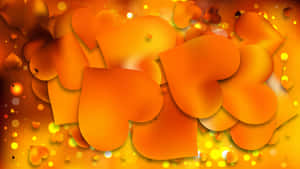 Caption: A Vibrant Orange Heart Symbolizing Love And Warmth Wallpaper