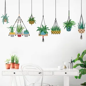 Caption: A Vivid Collection Of Indoor Hanging Plants In Stylish Pots Wallpaper