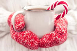 Caption: A Warm Pair Of Knit Mittens Wallpaper