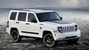 Caption: Adventure Awaits With Jeep Liberty Wallpaper