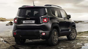 Caption: Adventure Awaits With The Jeep Renegade Wallpaper