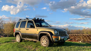 Caption: Adventure-ready Jeep Liberty Suv Wallpaper