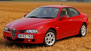 Caption: Alfa Romeo 156 - The Embodiment Of Italian Elegance And Performance Wallpaper
