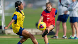 Caption: Ashley Sanchez Confidence On The Soccer Field Wallpaper