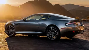 Caption: Aston Martin Db9 - Luxury And Performance On Display Wallpaper
