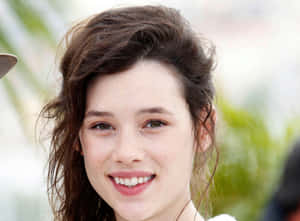 Caption: Astrid Berges-frisbey Striking A Pose Wallpaper