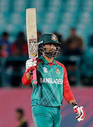 Caption: Bangladesh Cricket Star Shakib Al Hasan In Action Wallpaper