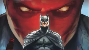 Caption: Batman And Red Hood Face Off Wallpaper