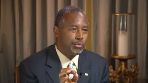 Caption: Ben Carson Engaged In Discussion Wallpaper