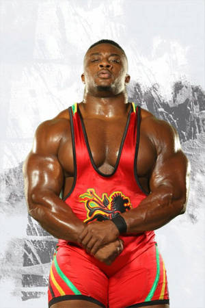 Caption: Big E, A Talented American Wrestler, Displaying His Muscular Physique Wallpaper