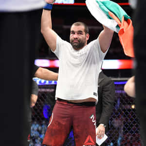 Caption: Blagoy Ivanov Triumphantly Holding Bulgarian Flag Wallpaper