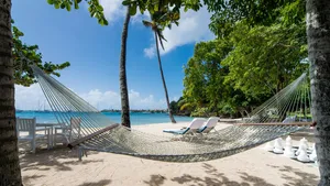 Caption: Breathtaking Caribbean Island Beach Wallpaper