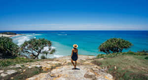 Caption: Breathtaking Sunrise Over The Sunshine Coast Wallpaper