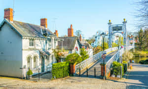 Caption: Breathtaking View Of Eastgate Clock Tower In Chester, United Kingdom. Wallpaper