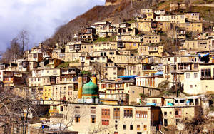 Caption: Breathtaking View Of Residential Houses On The Mountain Slope In Tehran Wallpaper